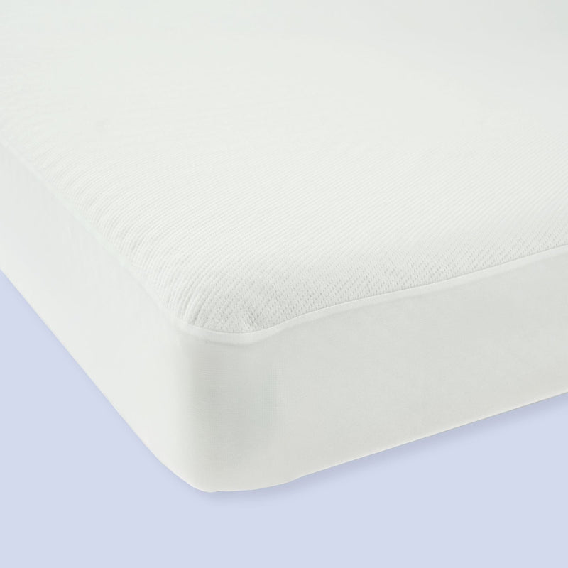 White mattress with fitted sheet, showcasing smooth texture and corner detail for optimal bed comfort.