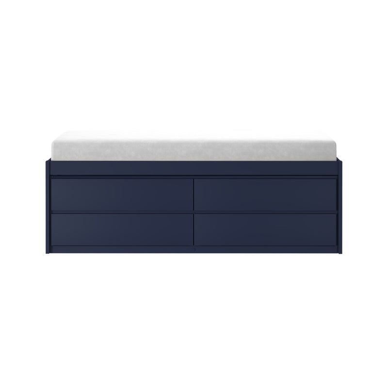 Modern navy blue dresser with white changing pad on top — nursery changing table with spacious storage drawers