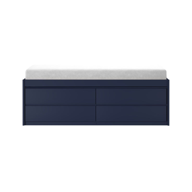 Modern navy blue dresser with white changing pad on top — nursery changing table with spacious storage drawers