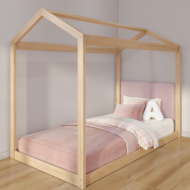 Natural wood house-frame toddler bed with pink bedding, plaid sheets and plush letter A in modern kids' bedroom