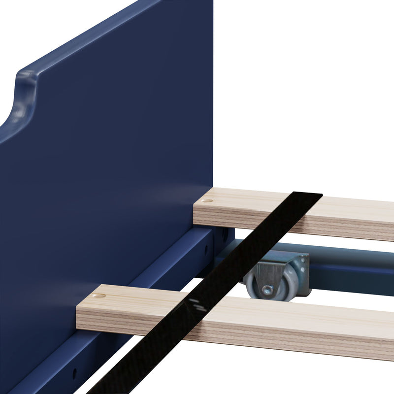 Close-up of navy blue metal bed frame with wooden slats, black support strap and caster wheel showing mattress foundation hardware