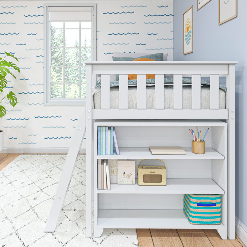 White loft bed with built-in shelves and storage basket in bright coastal nursery with blue wave wallpaper, children's books, retro radio and window light