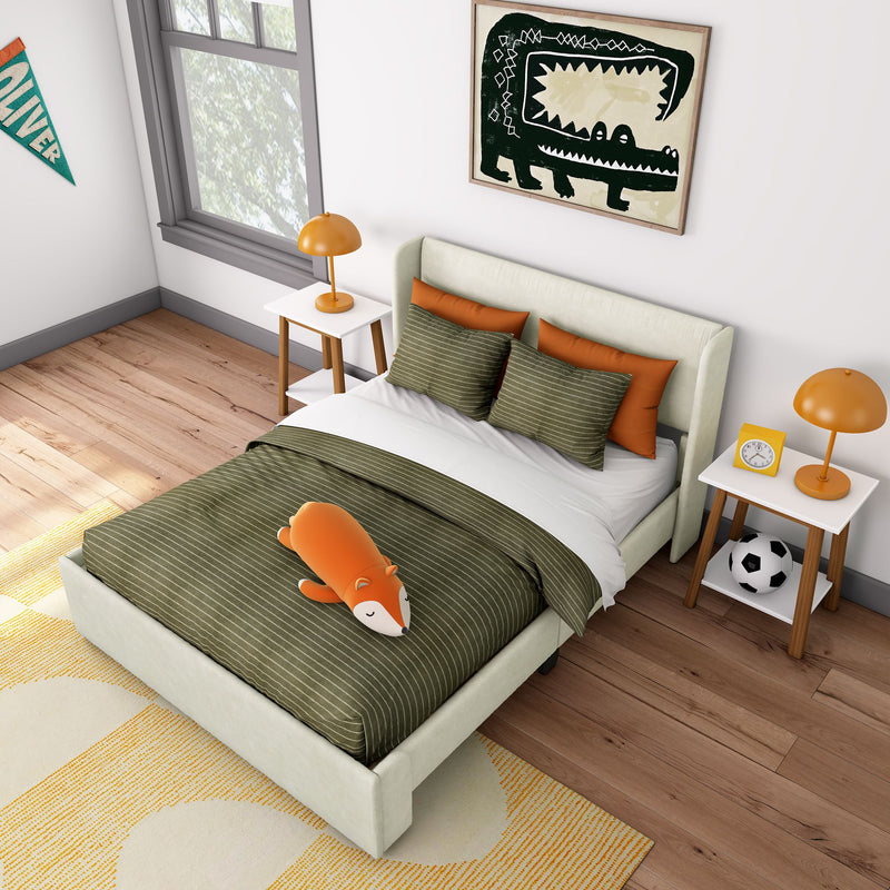 Modern kids bedroom with green striped bedding, orange accent pillows and lamps, plush fox toy on bed, bedside tables with soccer ball, framed crocodile wall art and hardwood floors.