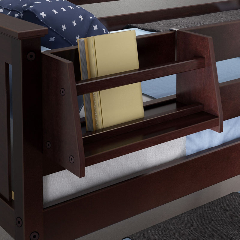 Dark wood kids bunk bed with integrated stair bookshelf and storage holding a beige hardcover book, blue cross-pattern pillow and gray blanket