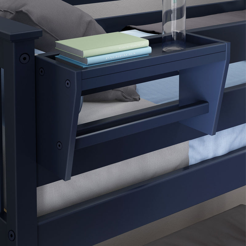 Navy blue bunk bed with built-in bedside shelf holding stacked pastel books and a clear water bottle in a modern bedroom