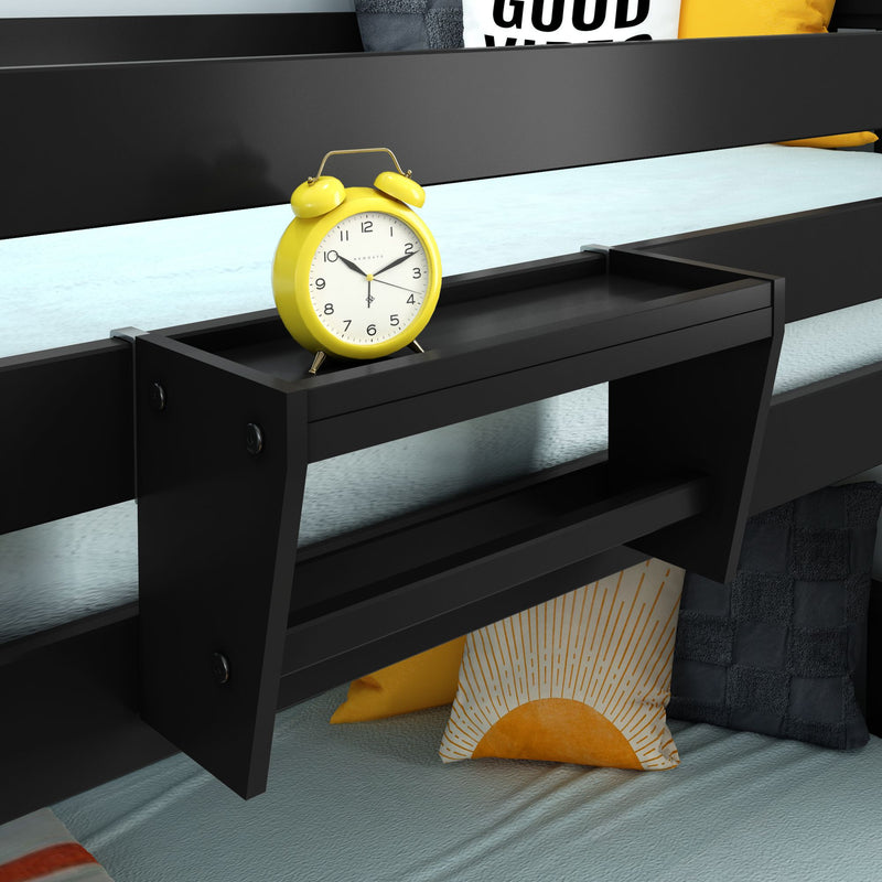 Yellow alarm clock on a black bunk bed shelf with turquoise bedding and sun-print decorative pillow for modern bedroom décor