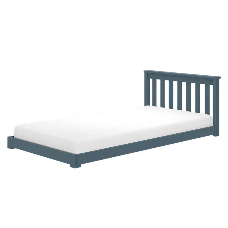 Blue wooden platform bed with slatted headboard and white mattress, modern low-profile frame for bedroom or kids' room