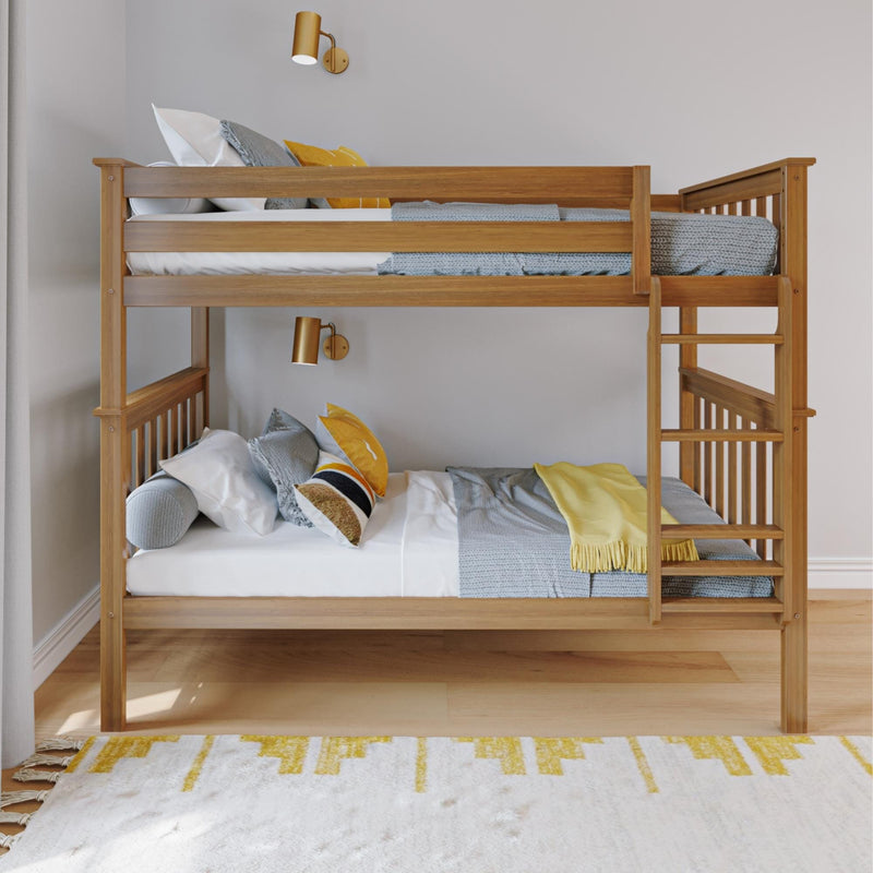 Solid wood bunk bed with ladder, gray knit bedding and yellow accent pillows in modern kids' room with wall-mounted reading lights