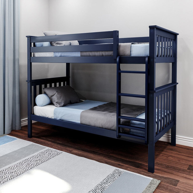 Navy blue wooden twin-over-twin bunk bed with ladder and safety rails, light blue and gray bedding in a modern children's bedroom with hardwood floor and area rug.