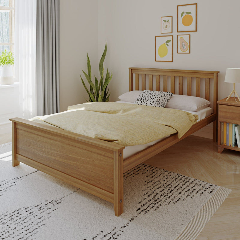 Minimalist modern bedroom with wooden bed frame, yellow bedding, snake plant, fruit wall art and natural light