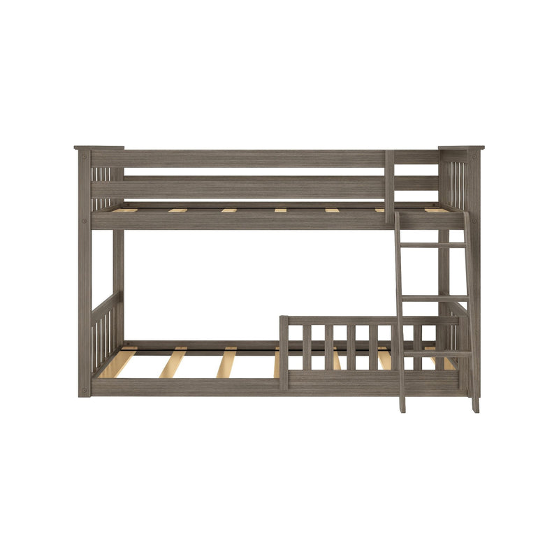 Rustic gray wood twin-over-full bunk bed frame with built-in ladder, slatted guardrails, visible mattress slats and farmhouse finish