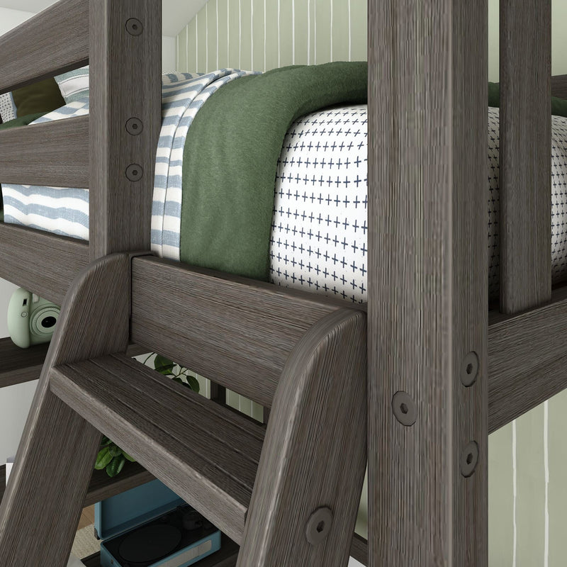 Close-up of gray wooden bunk bed ladder and guardrail with green blanket, blue striped throw and cross-pattern white sheets in a modern kids' bedroom with turquoise record player