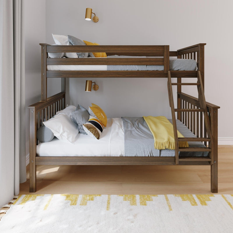 Wooden bunk bed with ladder in a modern kids' bedroom, cozy gray knit blankets and yellow accent pillows, gold wall sconces, neutral curtains and light hardwood floor