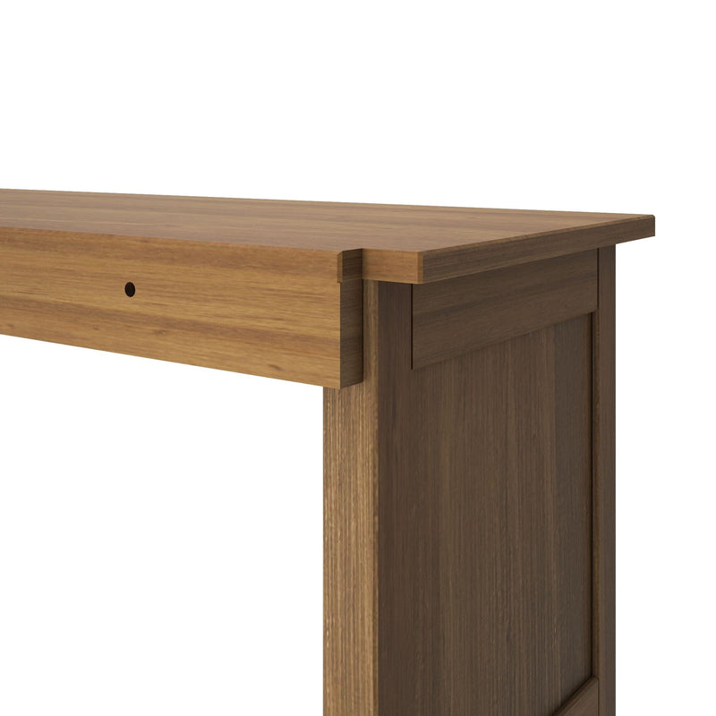 Wooden mantel shelf close-up showing corner joinery, natural wood grain and warm brown finish, modern farmhouse mantel detail