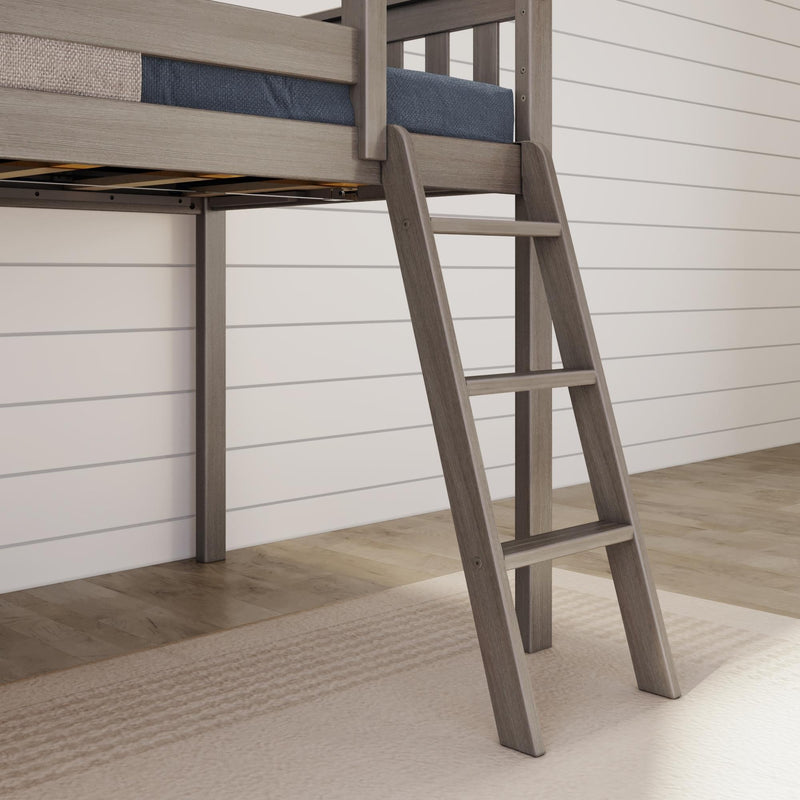 Gray-wash wooden loft bed ladder and guardrail with blue mattress cover against white shiplap wall in a modern farmhouse kids' bedroom