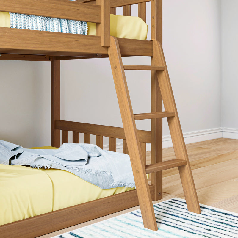 Natural wood bunk bed ladder and lower bed with yellow bedding and light blue throw in a modern kids' bedroom