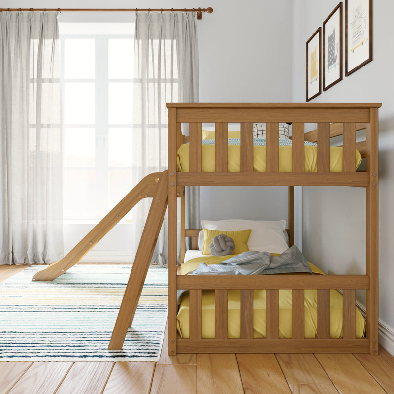 Modern wooden bunk bed with ladder and slide in bright nursery, yellow bedding, natural light through sheer curtains and framed cat wall art