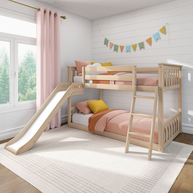 Modern wooden bunk bed with slide in a pastel kids' bedroom with pink curtains, colorful bunting and large window