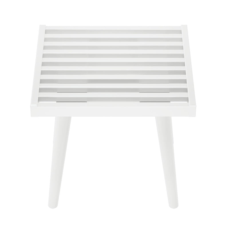 White slatted wooden stool with tapered legs on white background, modern minimalist furniture piece