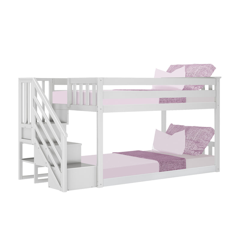 White wooden twin-over-twin bunk bed with staircase and built-in storage drawers, pink bedding and pillows, modern kids loft bed