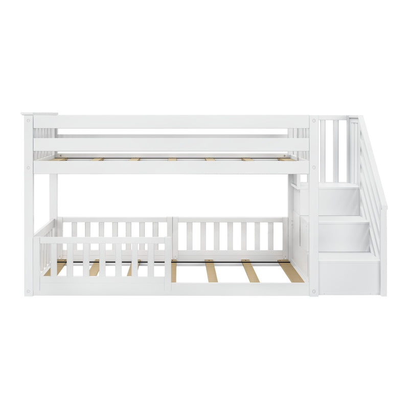 White wooden twin-over-twin bunk bed with built-in stairs, storage drawers and slatted guardrails — space-saving kids loft bed