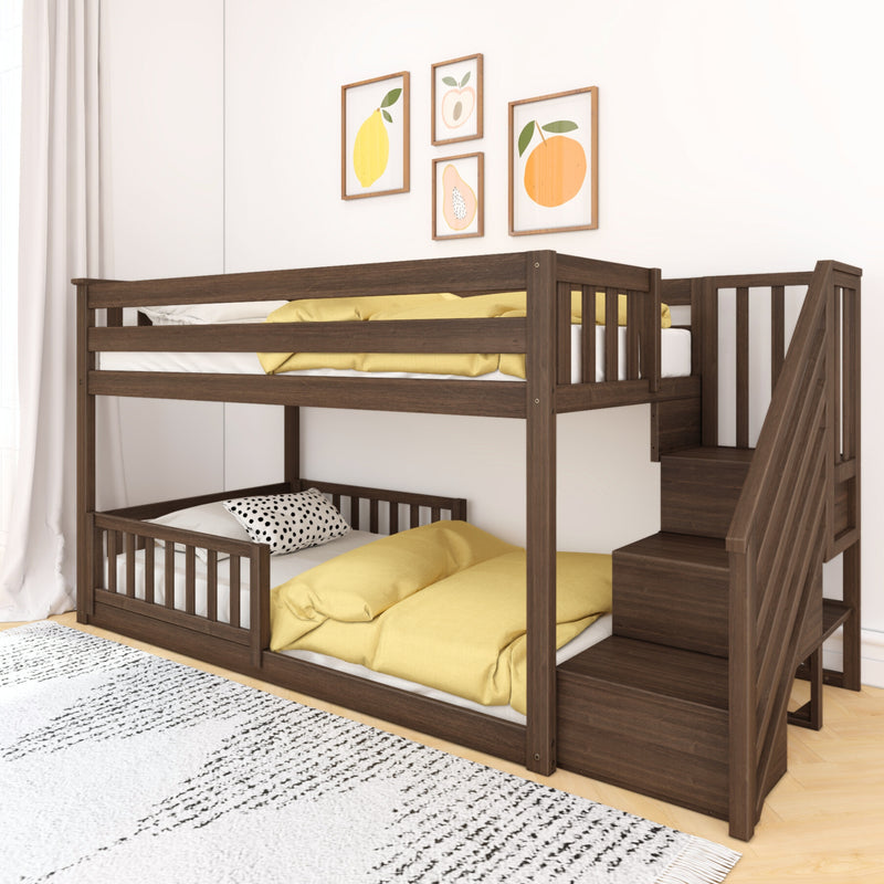 Dark walnut loft bunk bed with stairs in modern children's bedroom, yellow bedding and polka-dot pillow, fruit-themed framed prints, white curtains and textured area rug.