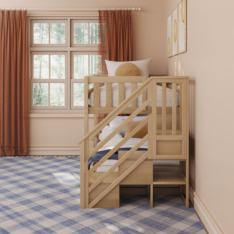 Wooden loft bed with built-in stairs and storage in a neutral kids bedroom with rust curtains, blue plaid rug, and large windows overlooking a forest