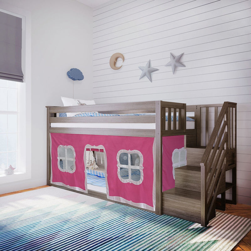 Wooden loft bunk bed with stairs and pink playhouse curtain, striped rug, gray roman shade and moon-and-star wall decor in children's bedroom
