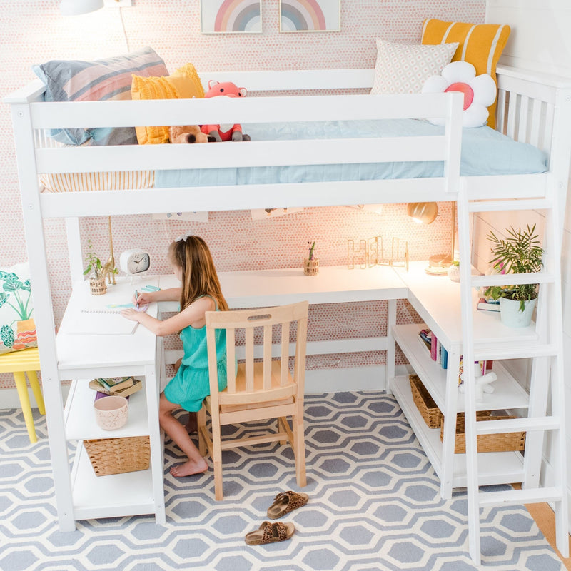 Child drawing at desk beneath a white loft bed with built-in desk and shelves in a pastel kids' bedroom with plush toys and study nook