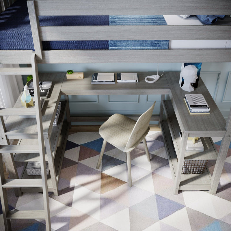 Light wood loft bed with integrated desk, shelving and chair in a modern kids study nook with geometric rug and blue bedding