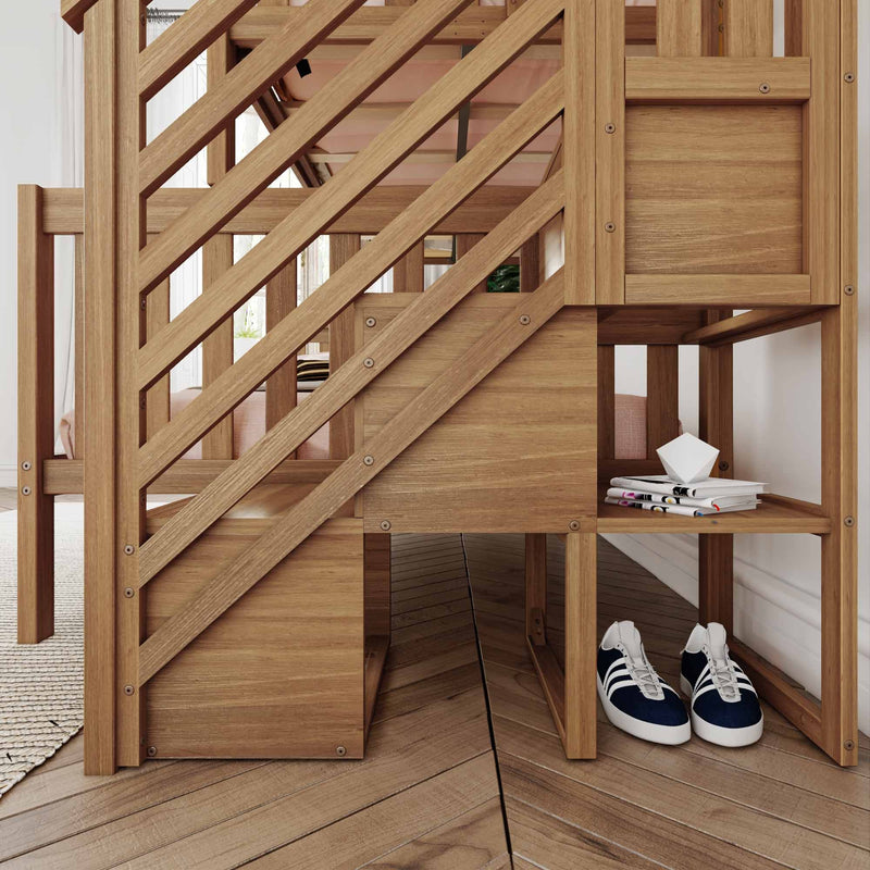 Modern oak staircase with diagonal slatted railing and built-in under-stair storage shelf holding magazines and navy sneakers in an entryway