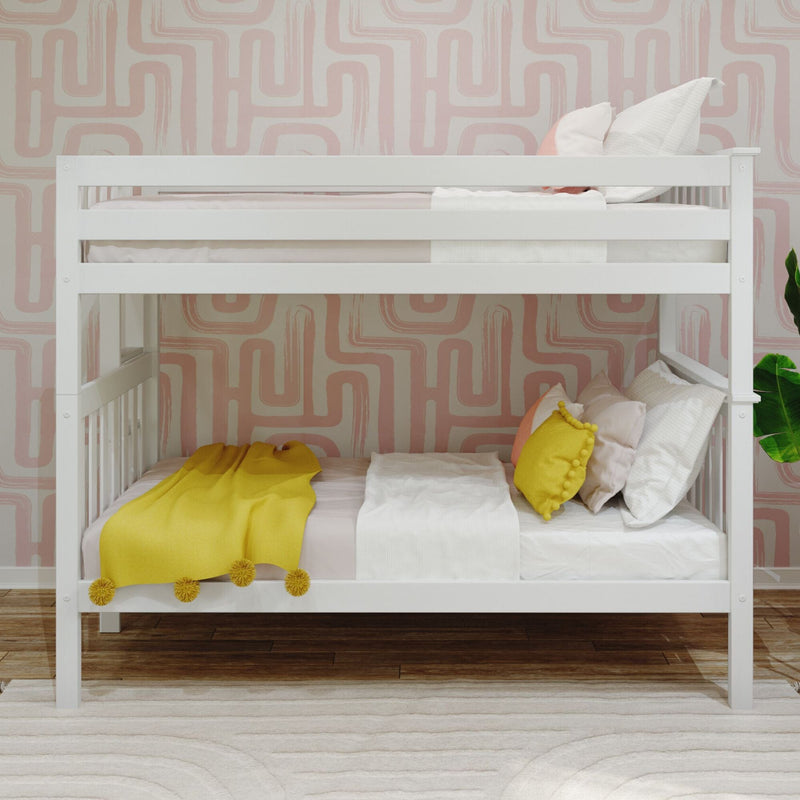White wooden bunk bed with yellow throw blanket and pom-pom pillow against pale pink abstract geometric wallpaper — modern kids' bedroom and nursery decor