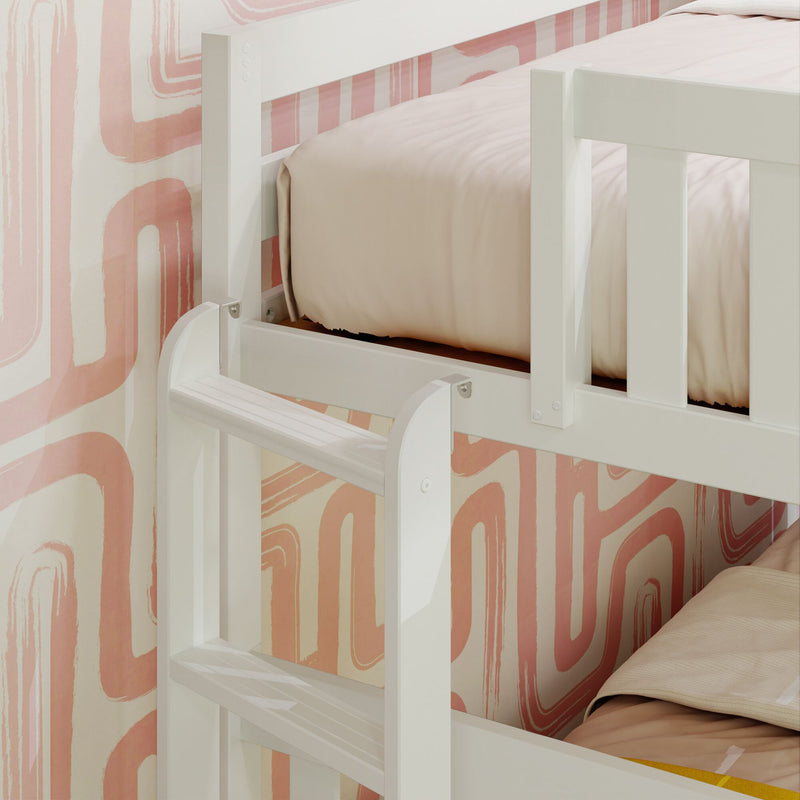 White wooden bunk bed with ladder and safety rail, pale pink bedding and retro pink geometric wallpaper in a children's bedroom