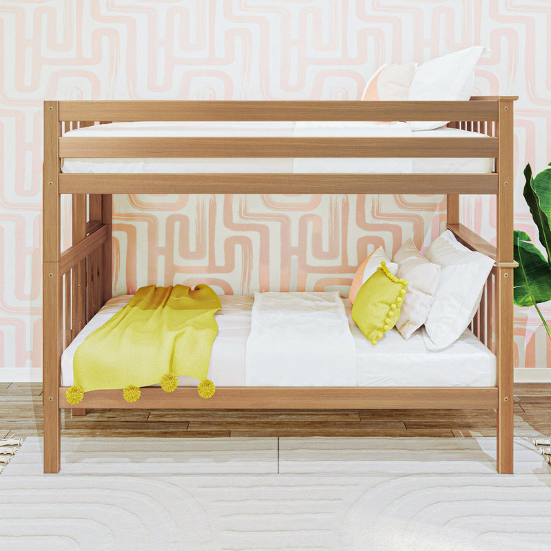 Twin-over-twin natural wood bunk bed in children's room with pastel pink geometric wallpaper, white bedding, yellow throw and pom-pom pillow, and indoor plant — kids bedroom decor, nursery design