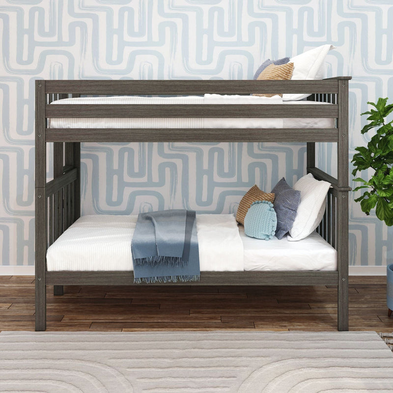 Gray wooden twin bunk bed in a modern kids bedroom with white and blue bedding, textured light-blue geometric wallpaper, decorative pillows and hardwood floors