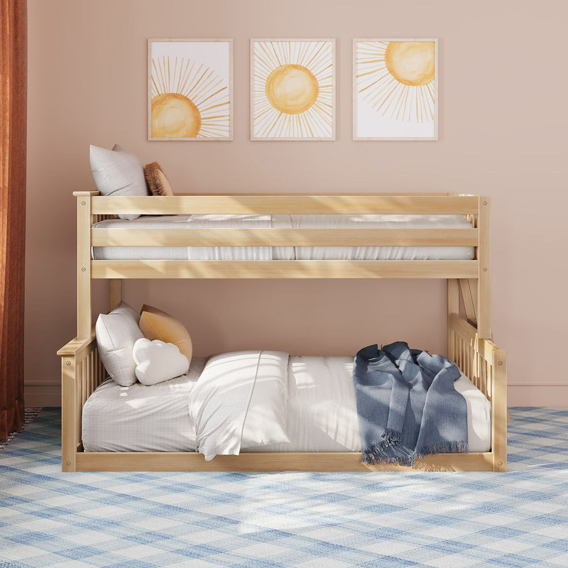 Wooden bunk bed in a neutral modern kids bedroom with sun wall art, white bedding, plush pillows, navy throw and blue plaid rug