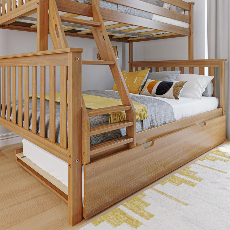 Solid natural wood bunk bed with built-in ladder and pull-out trundle, styled with gray and yellow bedding in a modern kids’ bedroom