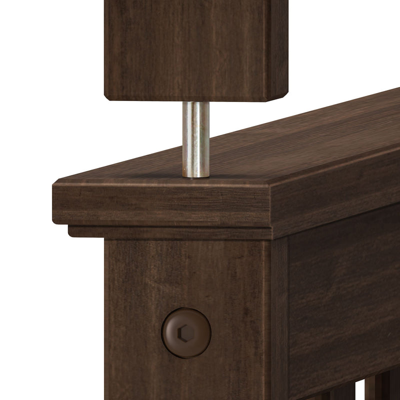 Close-up of dark walnut wooden bed frame post with metal support rod and recessed hex bolt, modern headboard detail