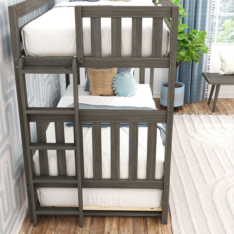 Gray wooden twin-over-twin bunk bed in a modern kids' bedroom with white striped bedding, blue round pom-pom pillow, tan accent pillow, ladder and potted plant