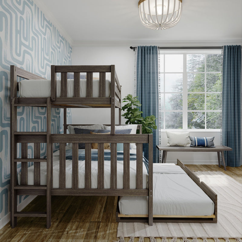 Wooden bunk beds with pull-out trundle in a bright kids' bedroom featuring blue geometric wallpaper, sheer blue curtains, large window, green plant and cozy pillows