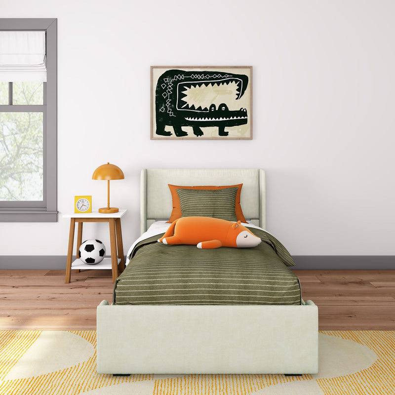 Kids bedroom with green striped bedding, orange plush fox, modern crocodile wall art, orange bedside lamp and soccer ball