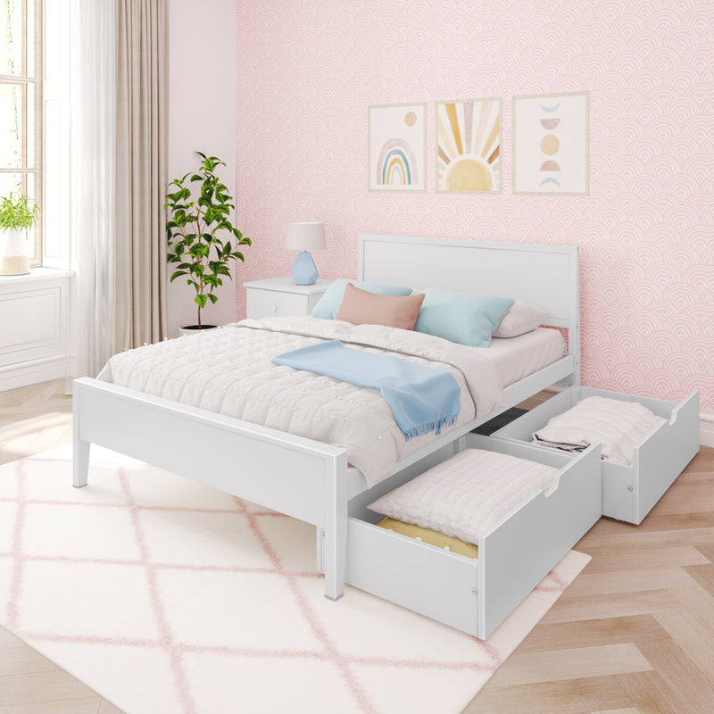 Cozy girls bedroom with white wooden twin bed, pastel pillows and throw, pink scallop wallpaper, framed rainbow and sun prints, blue bedside lamp, potted plant and under-bed storage drawers