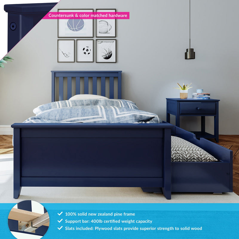 Navy blue kids trundle bed with pull-out mattress and 100% solid New Zealand pine frame, matching blue nightstand, striped bedding, sports-themed framed wall art and pendant lamp in modern children's bedroom