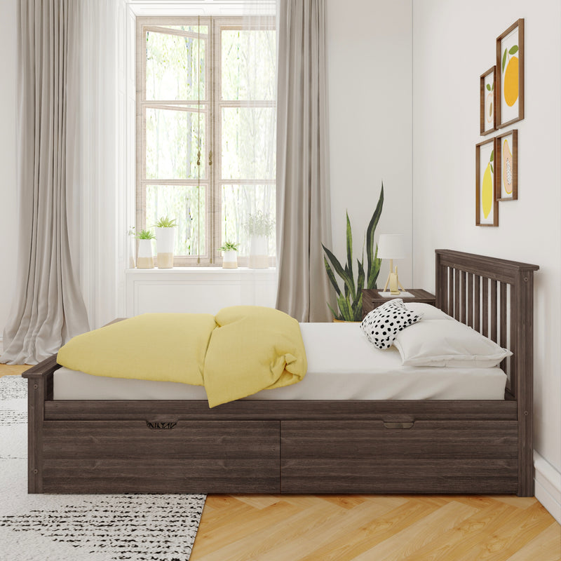 Bright modern bedroom interior with dark wood platform bed and yellow duvet, polka-dot pillow, large window with sheer curtains, potted plants and minimalist framed artwork