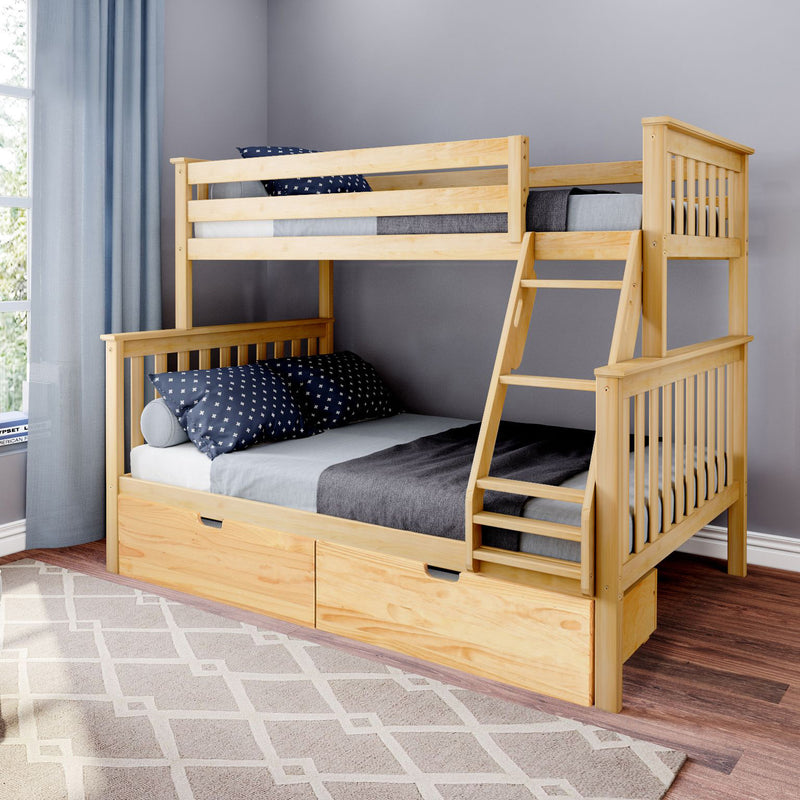 Solid natural wood twin-over-full bunk bed with built-in ladder and under-bed storage drawers in modern gray children's bedroom, navy star-patterned pillows and light hardwood floor