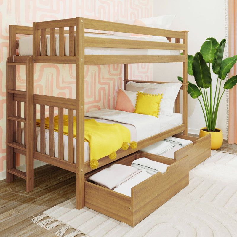 Twin wooden bunk bed with under-bed storage drawers in a modern kids' bedroom with yellow bedding, pink geometric wallpaper, and a potted tropical plant