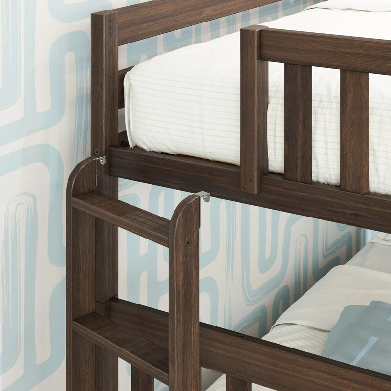 Close-up of dark walnut solid wood bunk bed ladder and guardrail with white mattress and retro blue geometric wallpaper