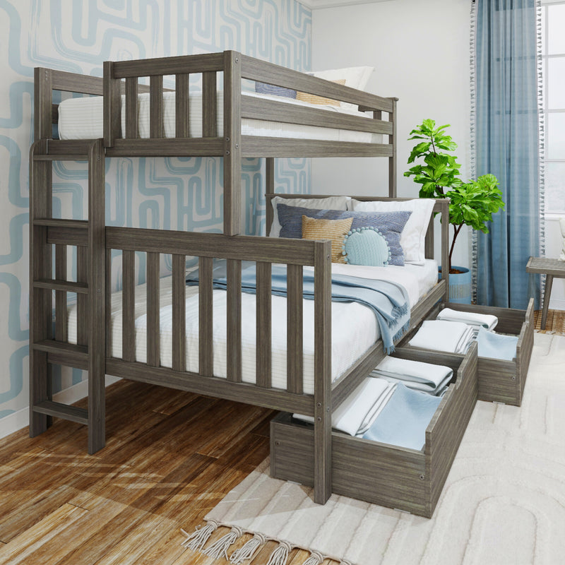 Gray wood twin-over-twin bunk bed with built-in under-bed storage drawers in a blue-accented kids' bedroom with patterned coastal wallpaper and potted plant