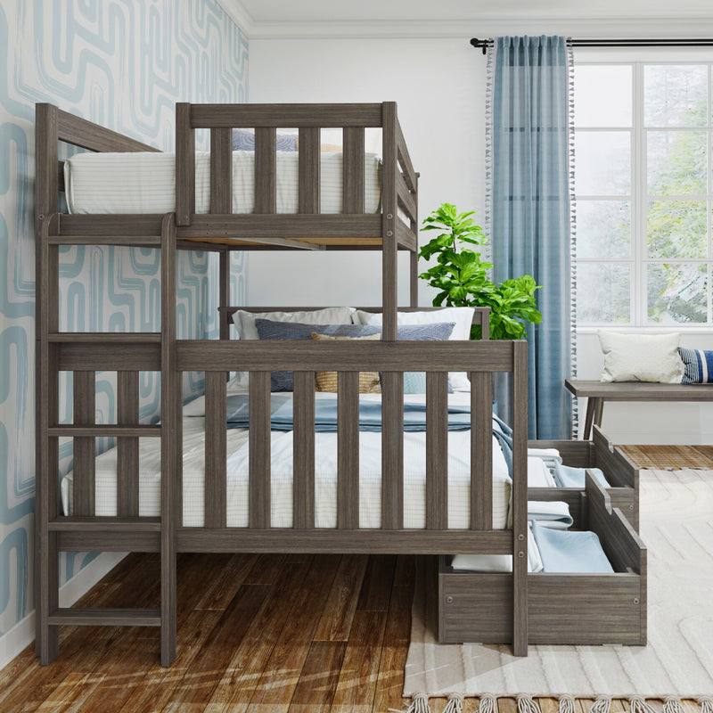 Gray wood twin-over-full bunk bed with built-in storage drawers in a modern kids' bedroom with blue geometric wallpaper, sheer blue curtains and a potted plant