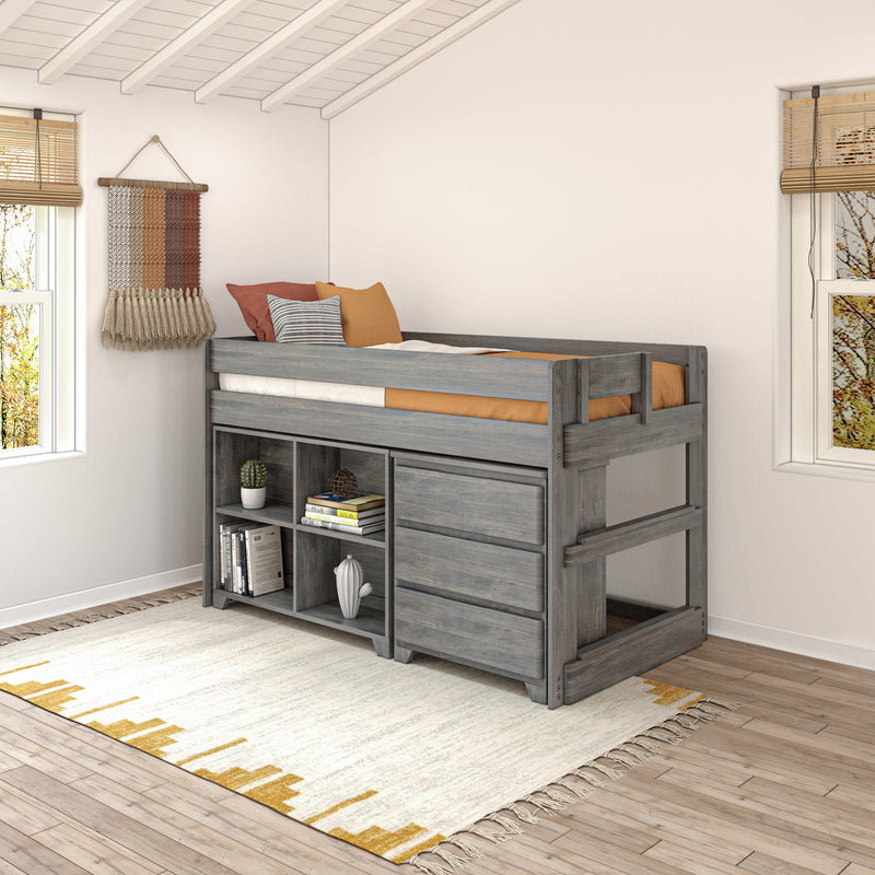 Gray wooden loft bed with built-in storage shelves and drawers in a boho kids bedroom, orange and striped pillows, woven wall hanging, bamboo blinds, light wood floor and patterned rug